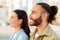 Smiling millennial caucasian couple enjoy trip at airport, train station, close up