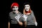 Smiling mimes on black background