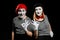 Smiling mimes on black background. Positive emotions and cheerful gestures