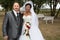 Smiling mixed interracial wedding couple pretty black african bride and bald caucasian groom