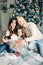 Smiling mother, father and little girl making selfie with camera