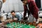 Smiling multicultural businessmen playing table football
