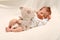 Smiling Newborn Baby Boy Sleeping with Teddy bear