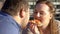 Smiling obese couple enjoying pizza taste, food passion, excess weight problem