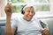 Smiling Older Senior Listening Music