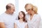 Smiling parents and little girl at home