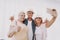 Smiling Pensioners Taking Selfie in Waiting Room.