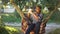 Smiling plus-size woman taking photos with camera admiring beauty of summer nature outdoors. Portrait of talented