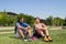 Smiling plus size women resting after training