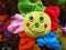 Smiling plush figure colorful for newborns