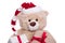 Smiling portrait teddy bear wearing Christmas hat with gift boxes on white background