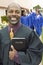 Smiling Preacher on garden path portrait