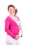 Smiling pregnant woman holds her belly
