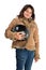 Smiling preteen girl holding bike helmet