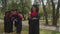 Smiling proud african american female graduate with diploma posing outdoors