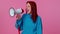 Smiling redhead girl talking with megaphone, proclaiming news, loudly announcing sale advertisement