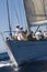 Smiling Sailor With Crew On The Sailboat Deck