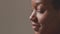 Smiling satisfied african american woman dreaming, enjoy, feel happiness. Closeup profile of black woman face. ProRes