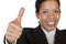 Smiling self confident business woman shows thumb