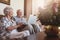 Smiling senior couple using laptop at home