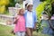 Smiling senior couple walking in yard