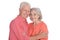 Smiling senior couple wearing bright clothing on white background