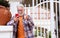 Smiling senior man using his smartphone for a video call. An elderly man with white hair and a beard enjoying technology. Concept