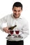 Smiling servant or waiter with wine