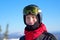 Smiling skier in helmet