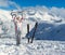 Smiling skier posing on the top of mountain Pirin