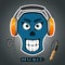 Smiling skull with music on in headsets, headphone