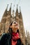 Smiling spanish woman visiting famous landmarks and attractions in center of Barcelona,Catalonia,Spain.Travel experience.