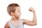 Smiling sport child boy showing hand biceps muscles strength