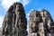 Smiling stone face on tower at Bayon castle