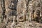 Smiling stone faces of the Bayon temple in Angkor Thom in Cambodia