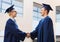 Smiling students in mortarboards