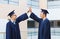 Smiling students in mortarboards