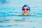 Smiling swimming woman