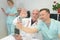 Smiling team doctors and nurses at hospital taking selfie