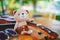 Smiling teddy bear doll with ukulele and sunglasses