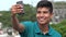 Smiling Teen Boy Taking Selfy