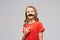 Smiling teenage girl with mustaches party prop