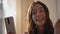Smiling teenager talking smartphone online closeup. Cheerful girl video calling