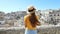 Smiling tourist girl visiting Matera city in Italy