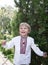 Smiling Ukrainian boy 4-5 years old in an embroidered shirt