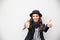 Smiling urban girl with smile on her face. Portrait of fashionable gir wearing a rock black style having fun outdoors in the city