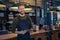 Smiling Waiter ready to take order at pub