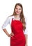 Smiling waitress with red apron