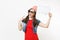 Smiling woman in 3d glasses with bucket for popcorn on head watching movie film, poiting index finger on say cloud with