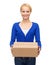 Smiling woman in casual clothes with parcel box
